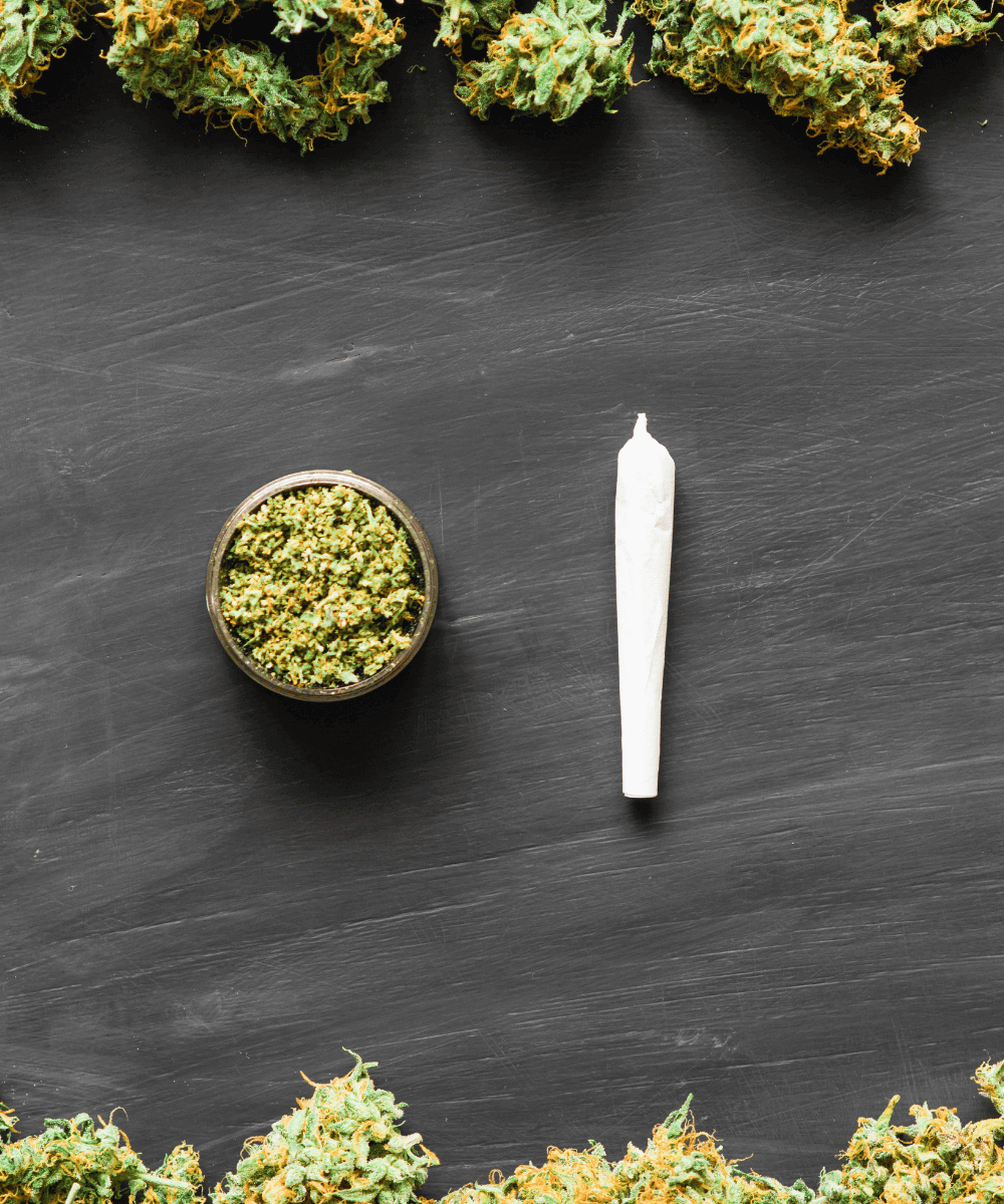 Joint und Grinder mit Blüten